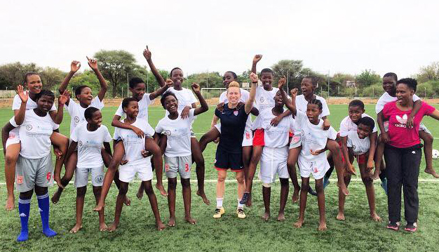 Spirit’s Joanna Lohman helps provide shoes for young soccer players in Botswana Featured Image