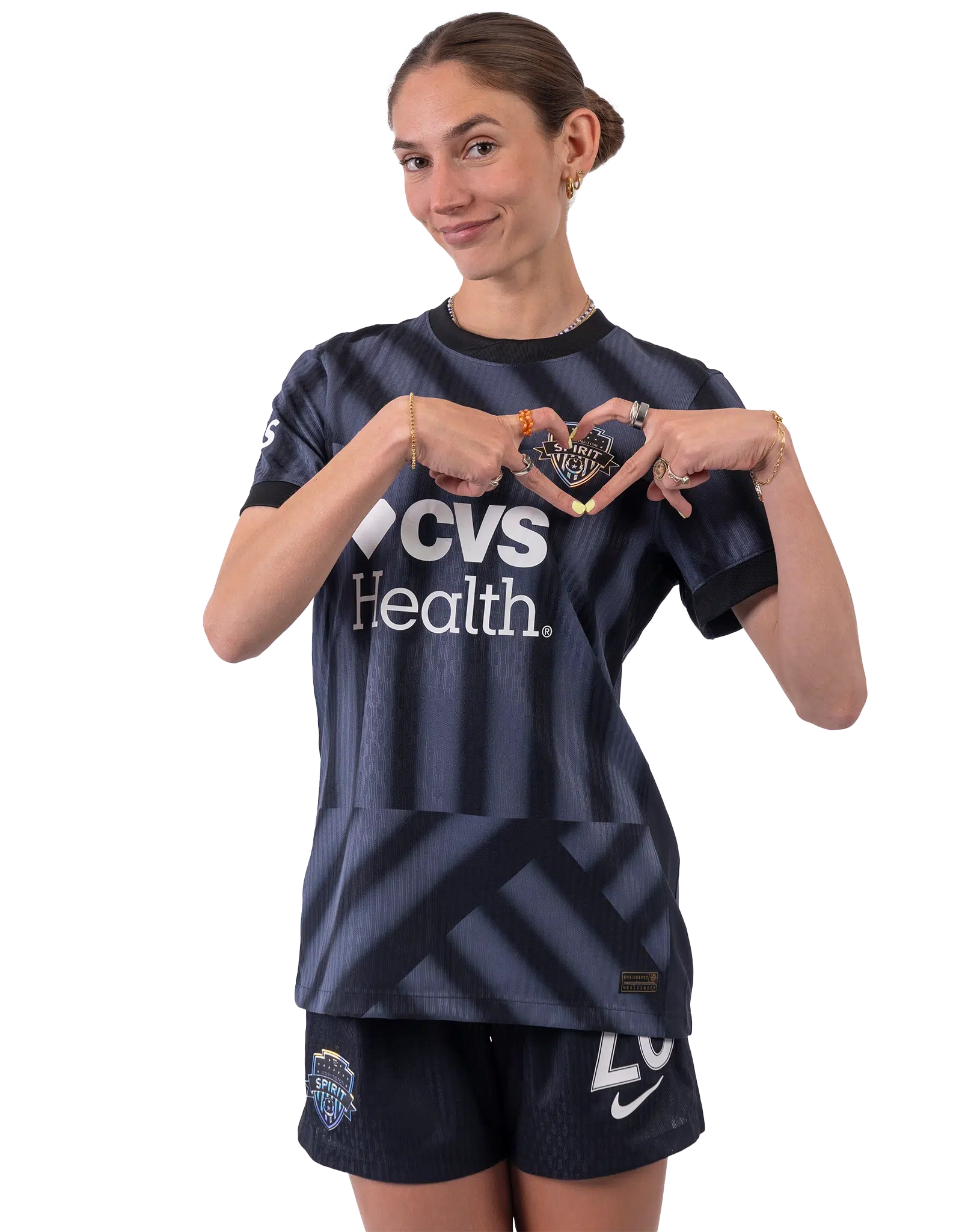 Paige Metayer makes a heart over the crest.