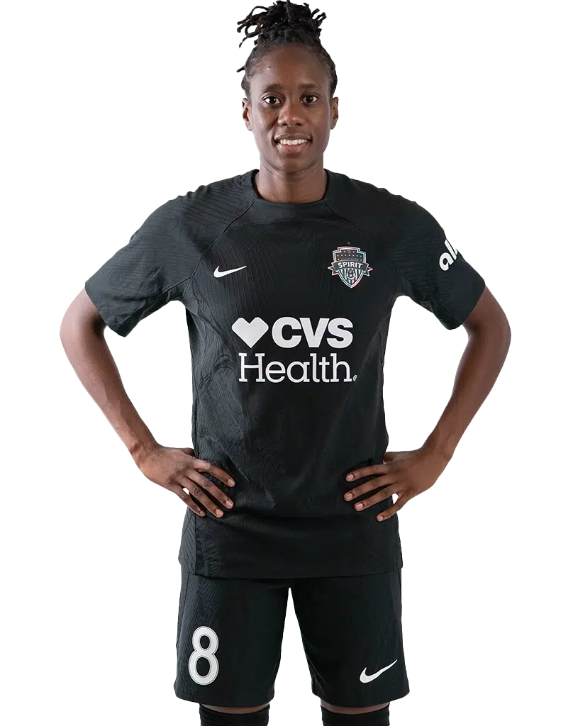 Ouleymata Sarr stands with her hands on her hips in a black Spirit uniform.