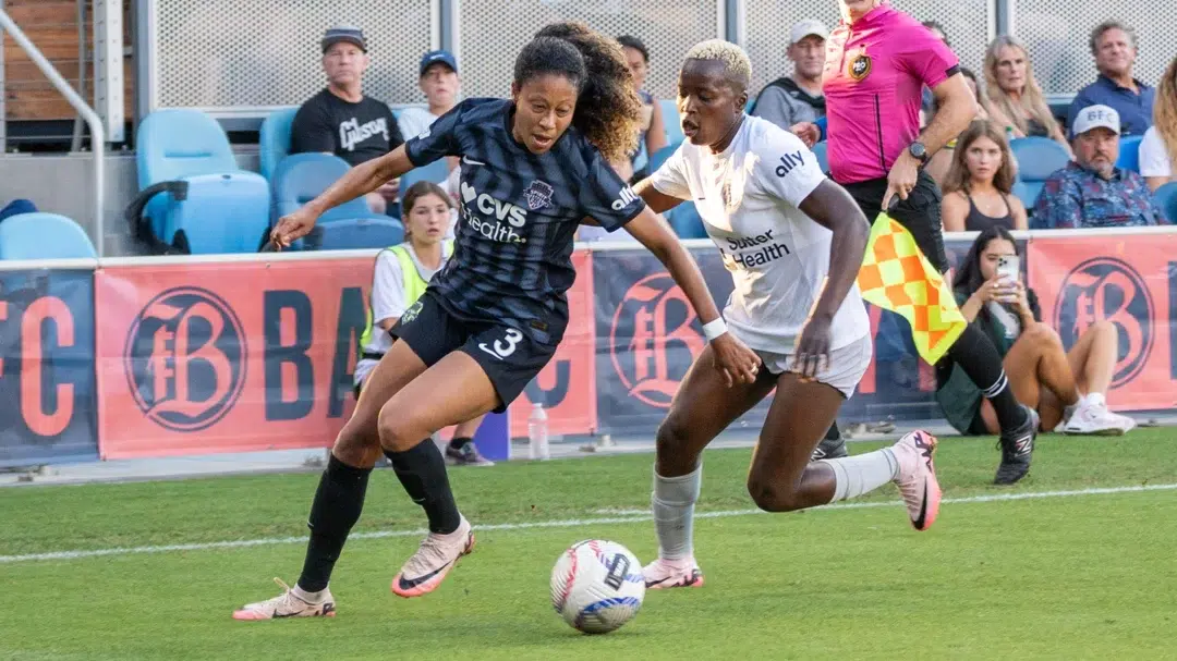 Casey Krueger takes on a Bay FC defender.