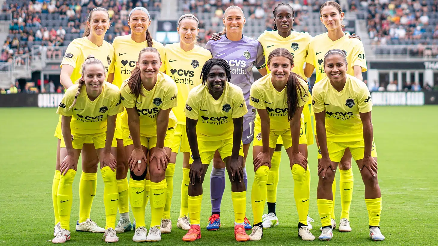 The starting lineup for the Spirit wearing yellow.