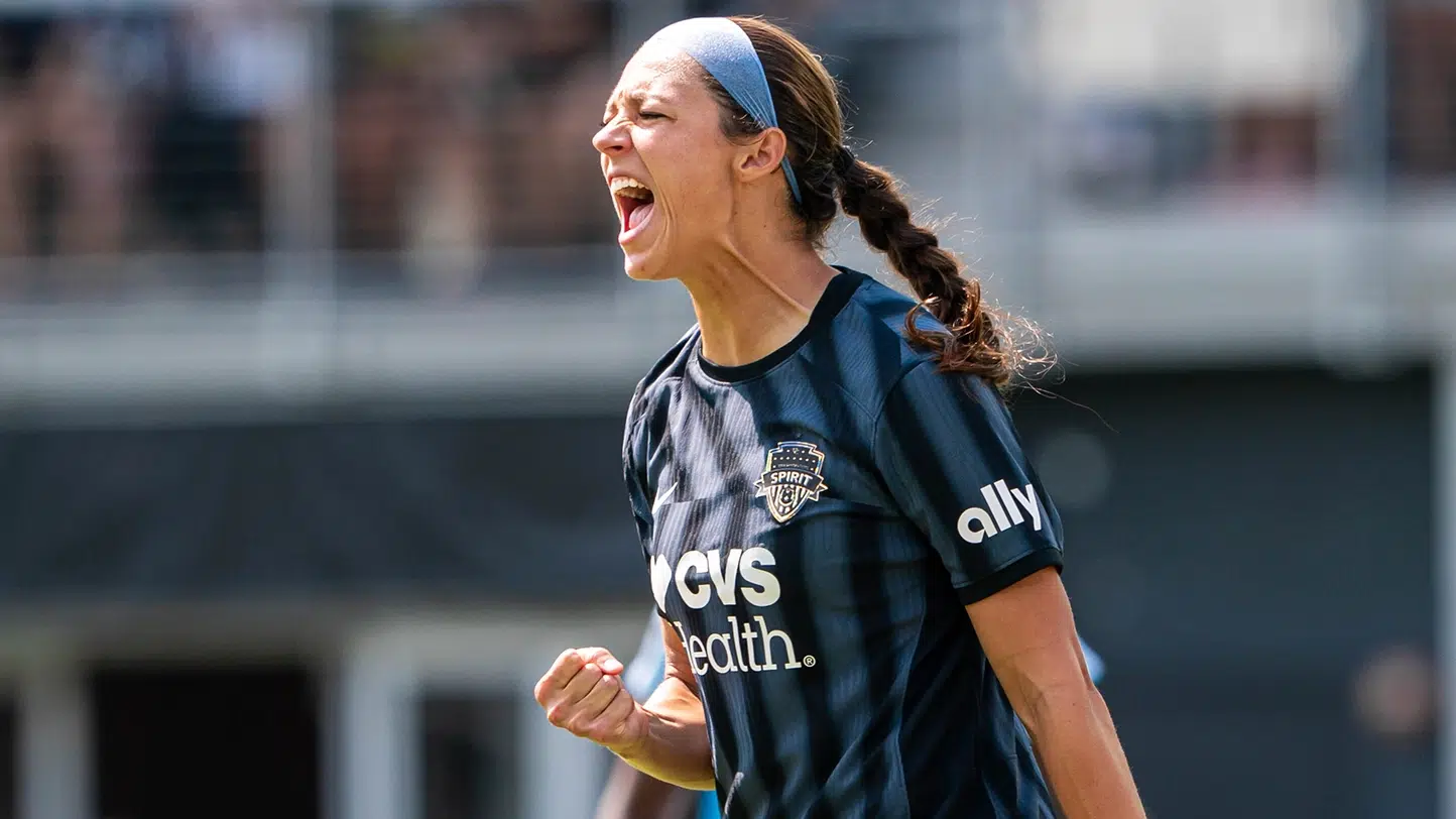 Ashley Hatch pumps her fist in celebration.