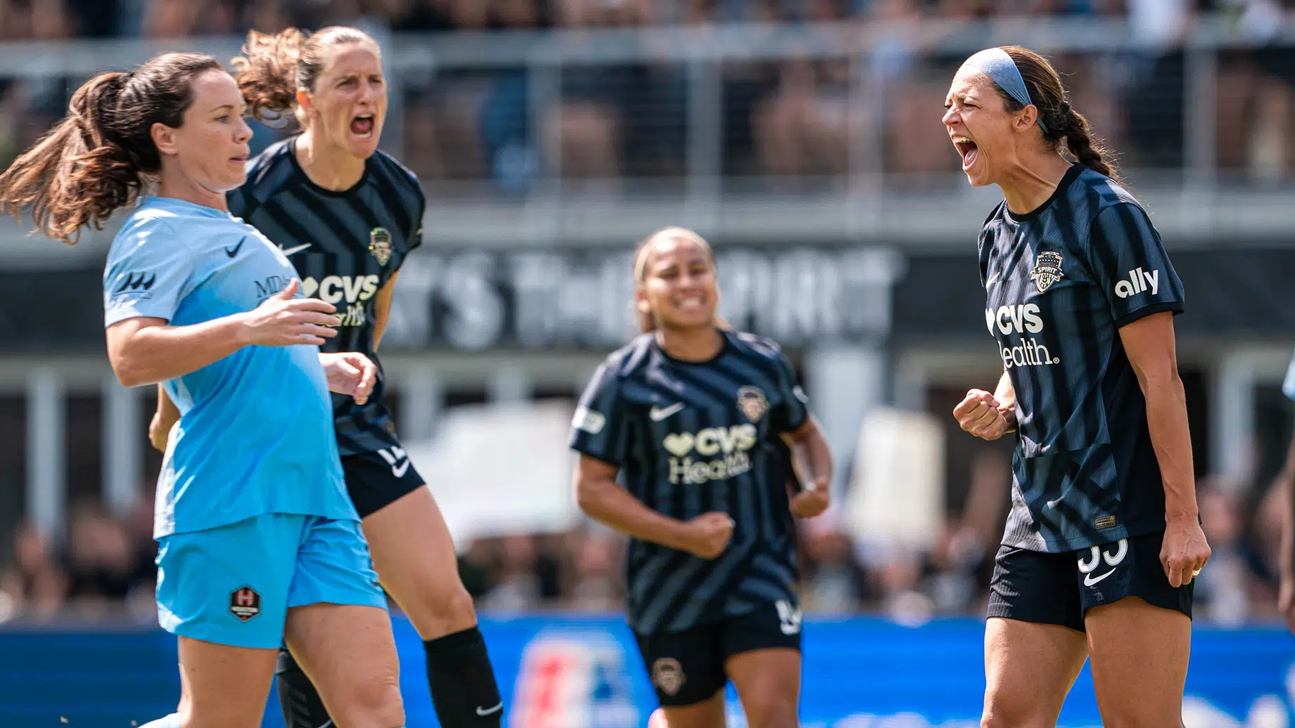 Ashley Hatch and Andi Sullivan celebrate.