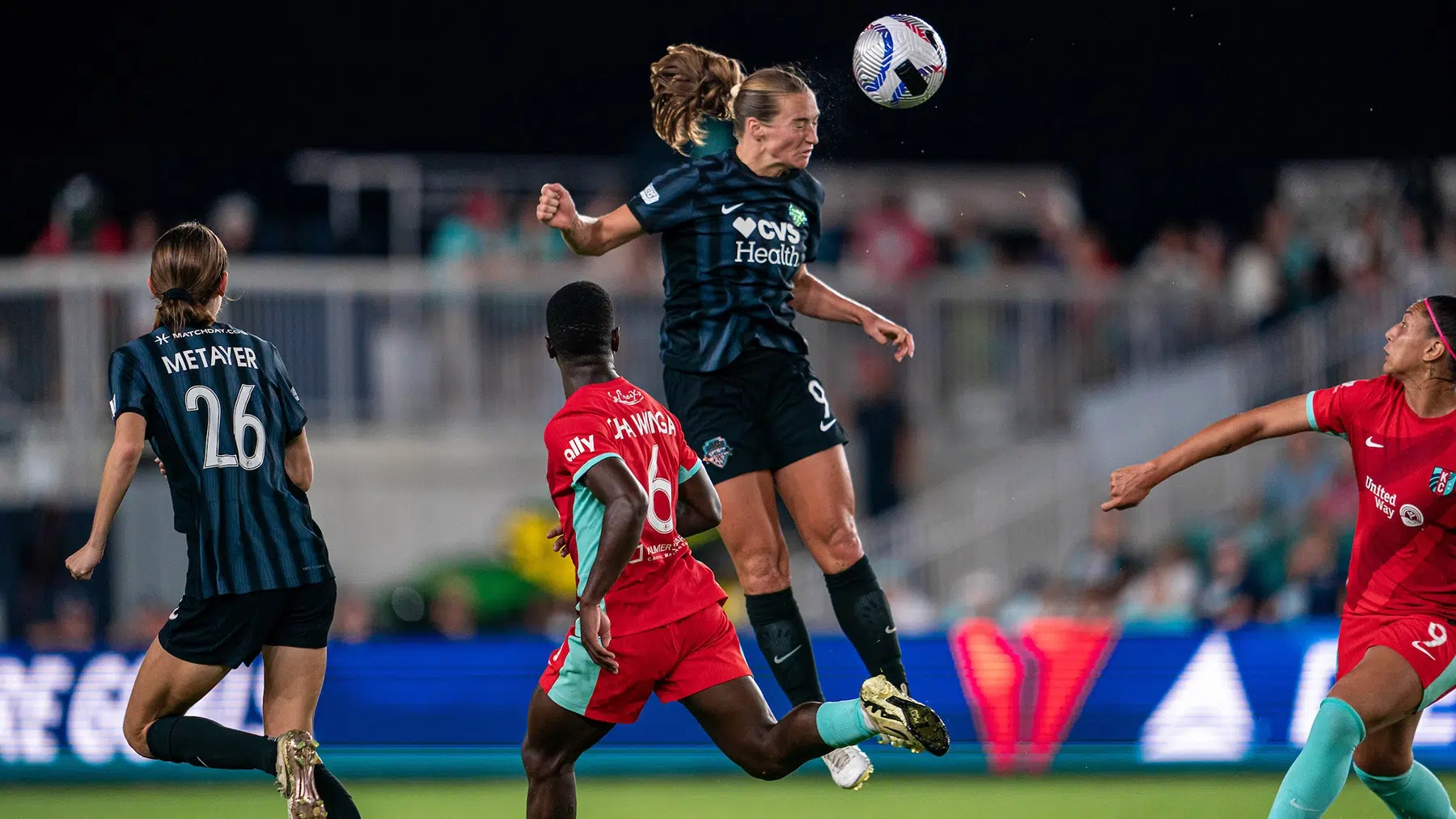 Tara McKeown heads the ball.