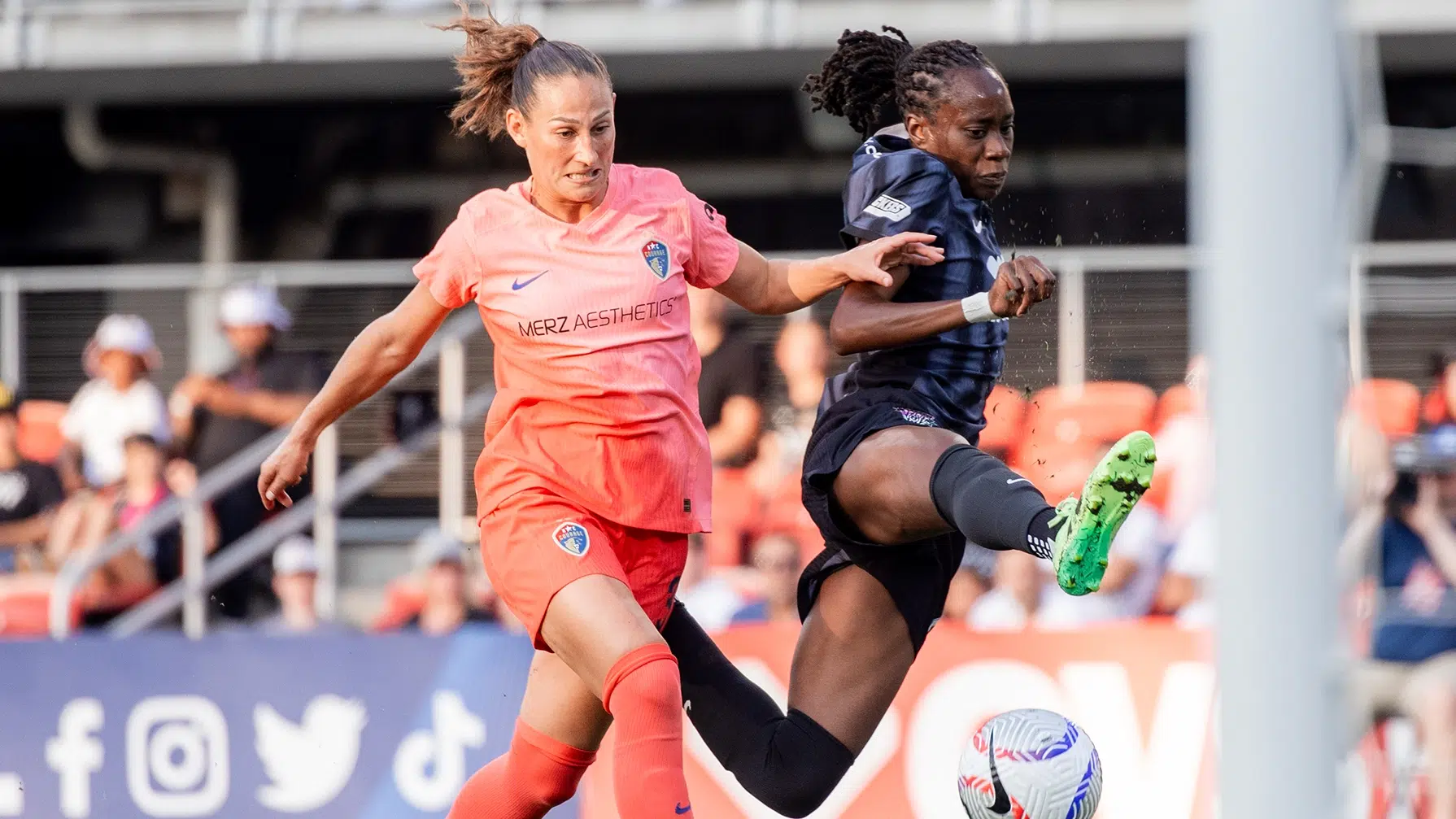 Ouleye Sarr battles a NC Courage defender for the ball.