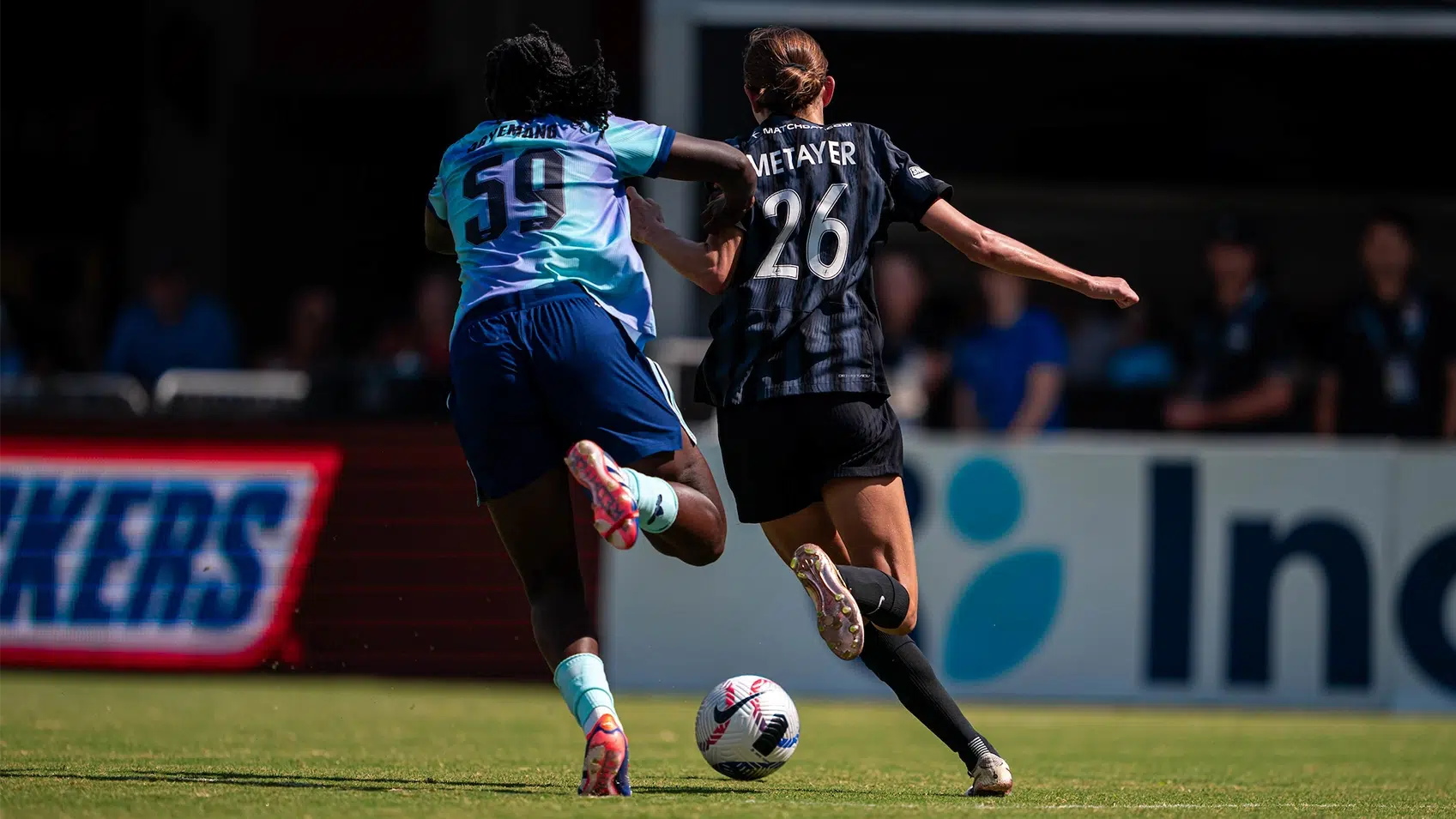 Paige Metayer battles for a ball.