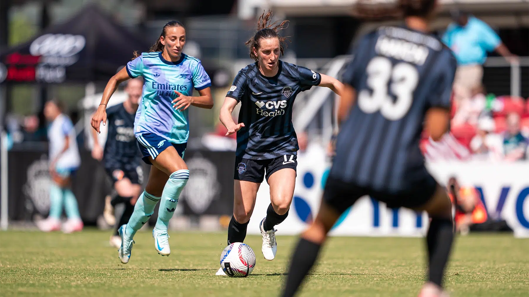 Andi Sullivan dribbling a ball.