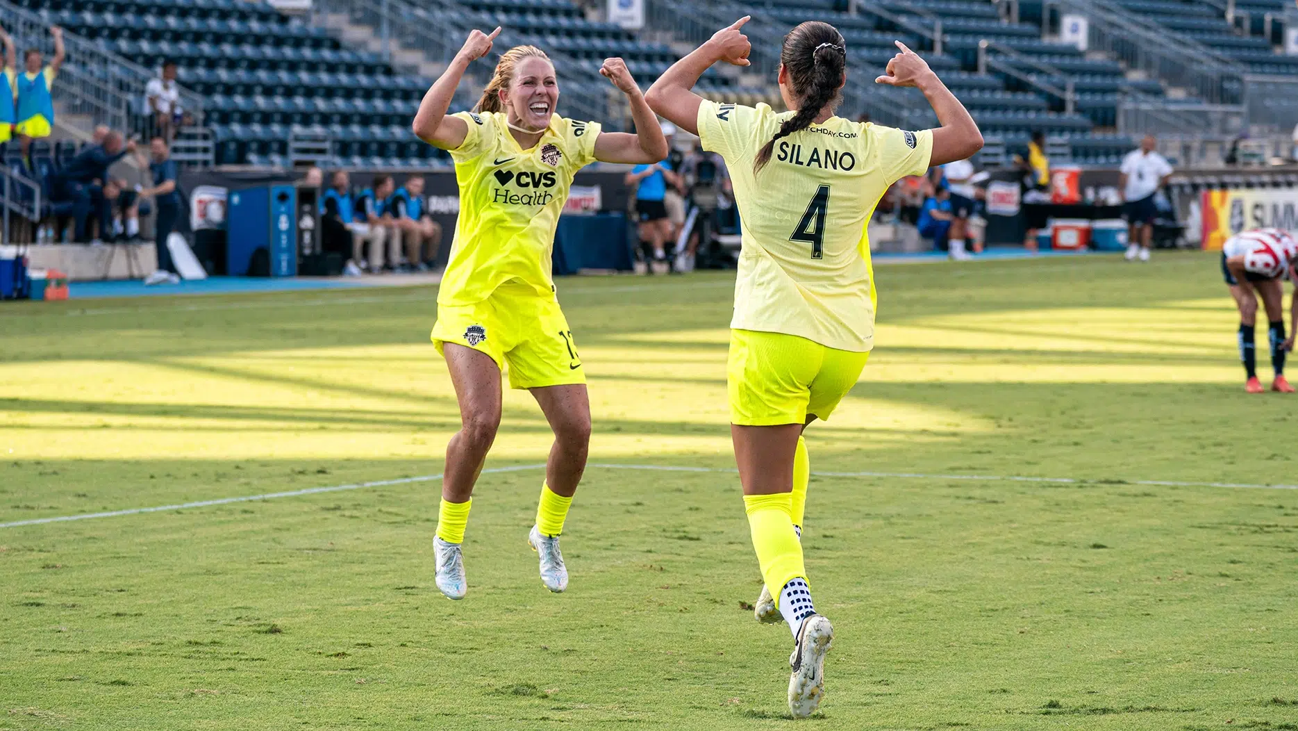 Brittany Ratcliffe and Lena Silano celebrate.