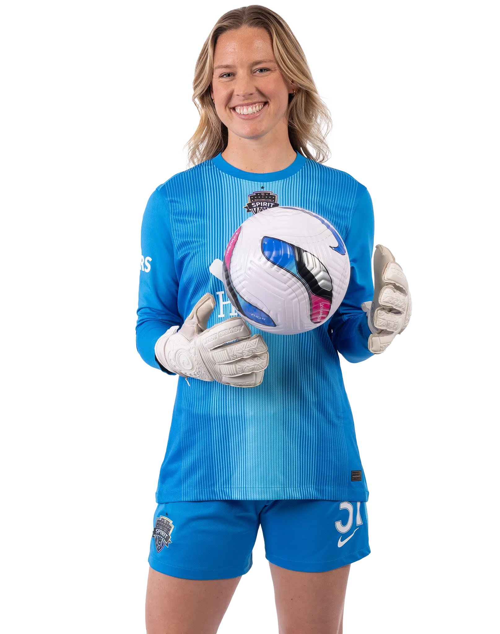 Kaylie Collins a blue goalkeeper kit.