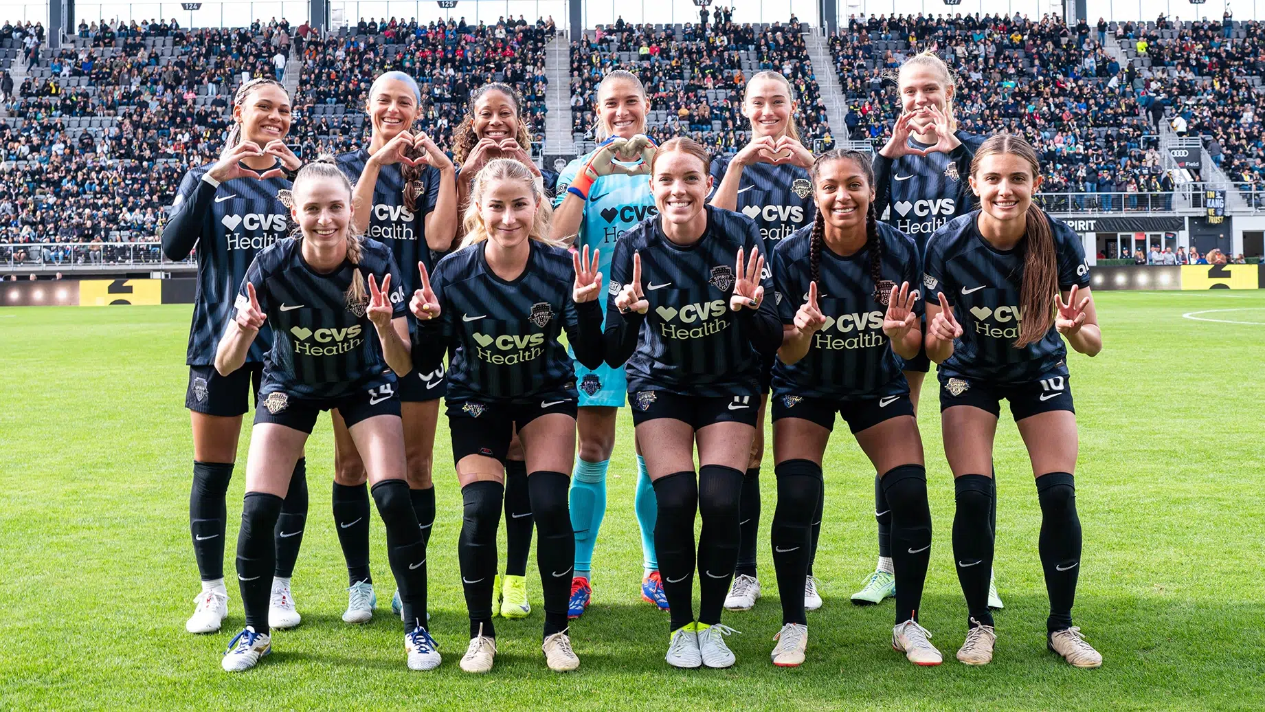 The Spirit Starting Xi in black kits.