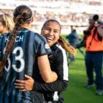 Ashley Hatch hugs Leicy Santos.