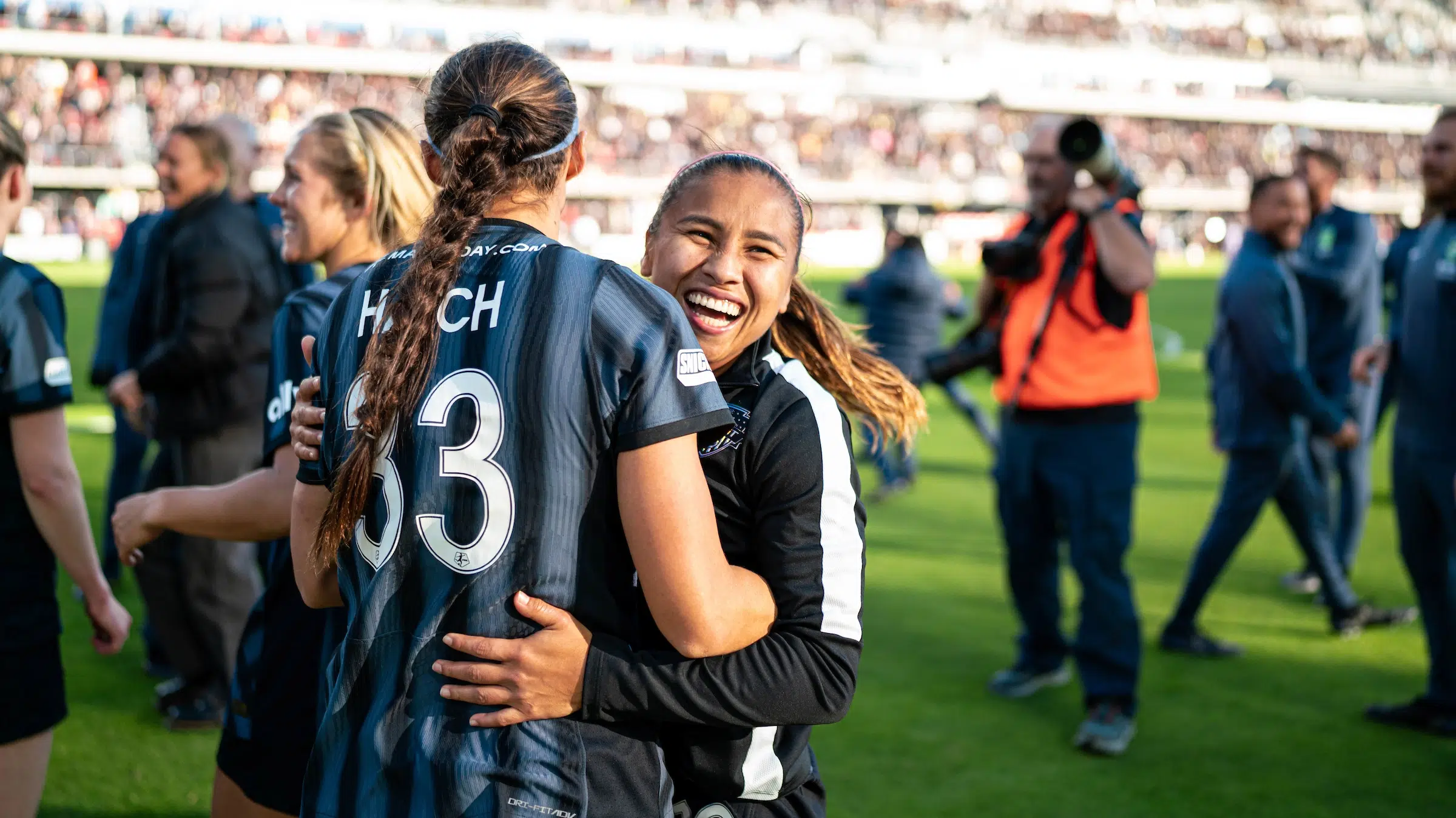 Ashley Hatch hugs Leicy Santos.