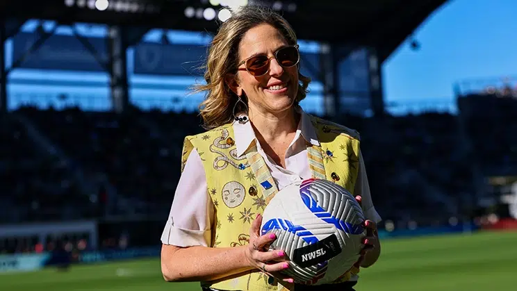 Jessica Berman presents the match ball.