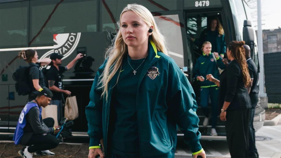 Chloe Ricketts in a Spirit green sweatsuit.