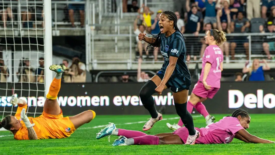 Croix Bethune celebrates after scoring a goal on San Diego.