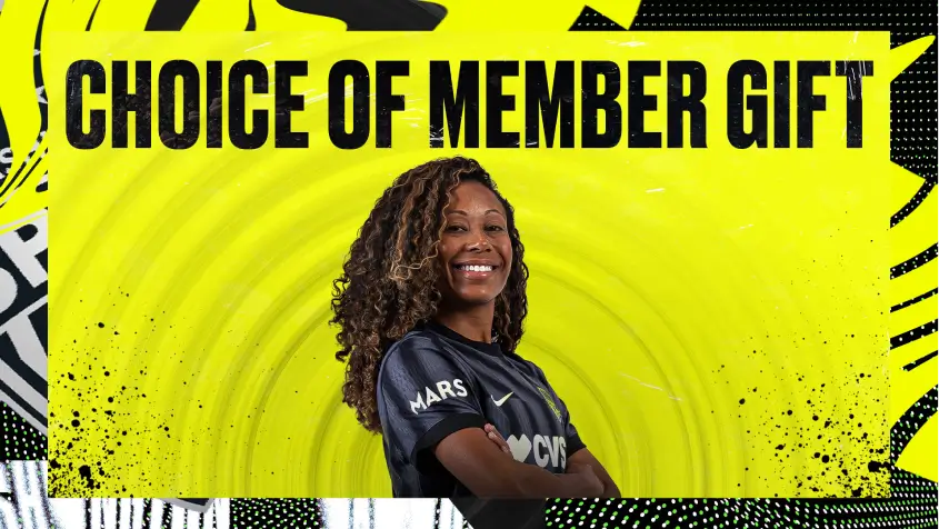 A player posing with "choice of member gift"