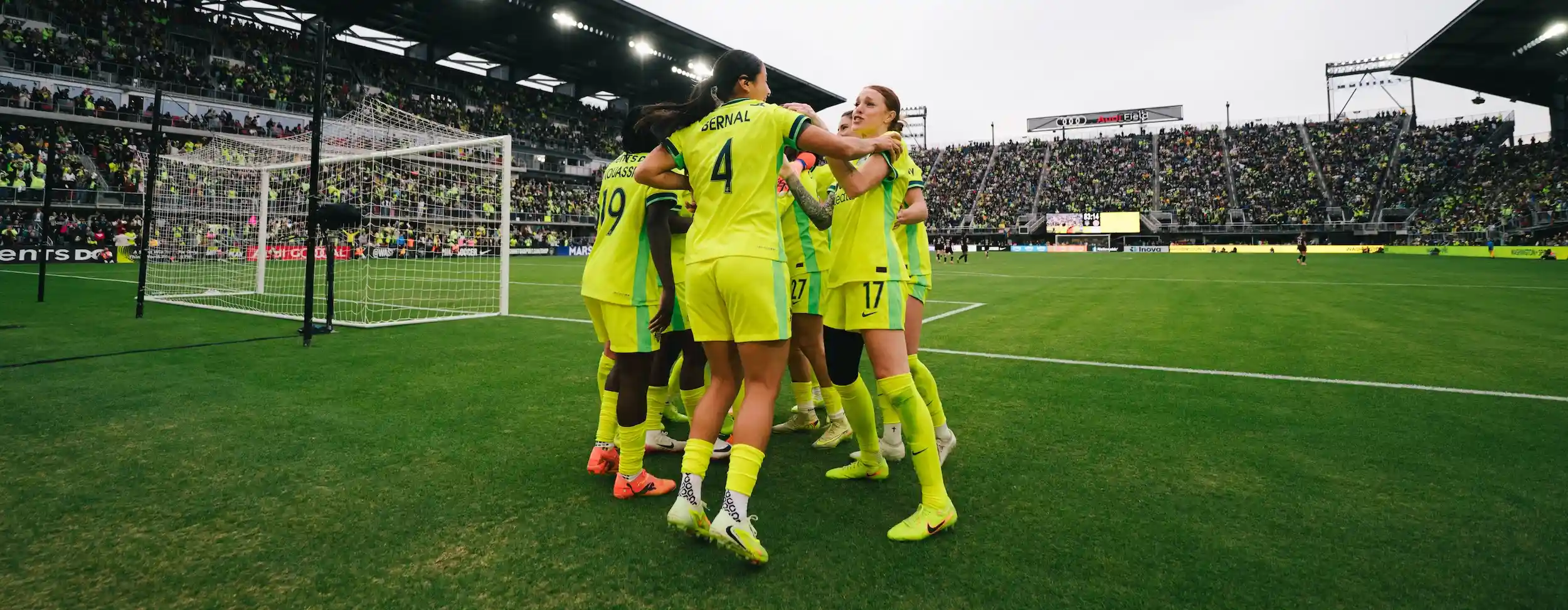 Team celebrating in a circle